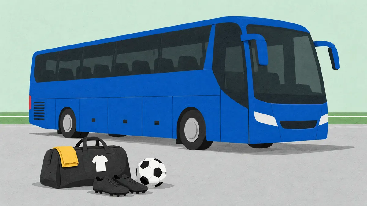 An unbranded team coach with a kit bag, boots and football: travel and other commitments may sit between Premier League fixtures.